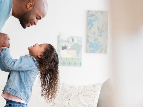 father having fun with his daughter